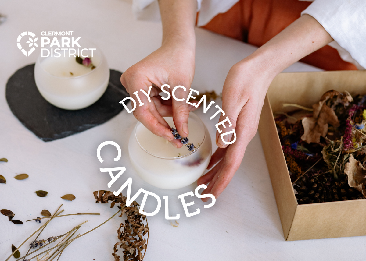 Woman adds dried flowers to a hand-made candle